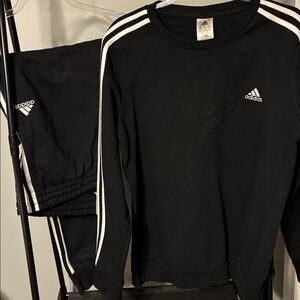 Adidas Women’s Black jogging suit with White Stripes